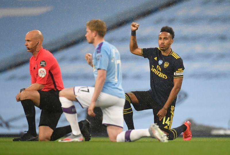 Premier league players kneeling